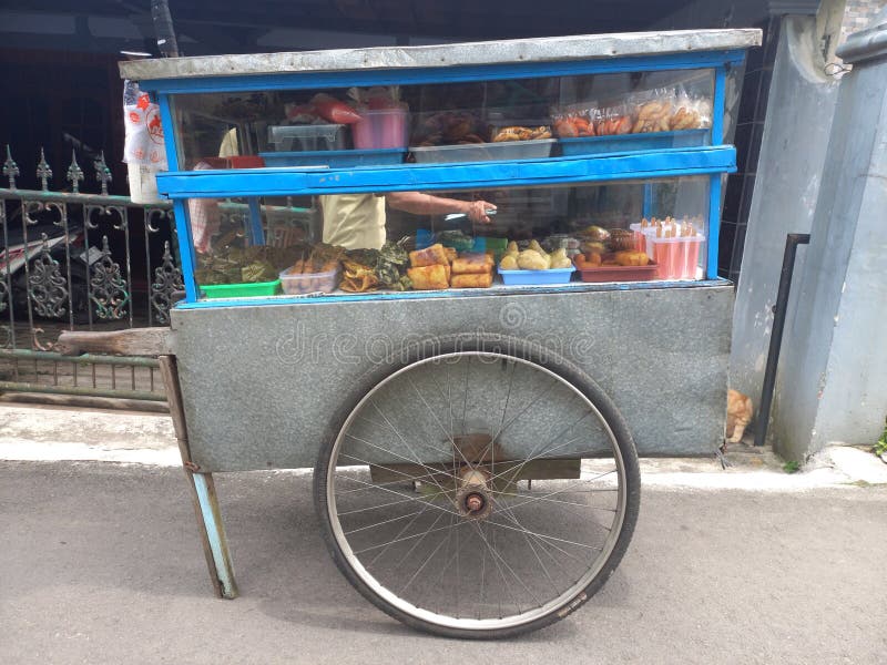 A Cart Selling Typical Indonesian Snacks Stock Photo - Image of snacks ... From Concept to Cart: Selling Fashion Designs